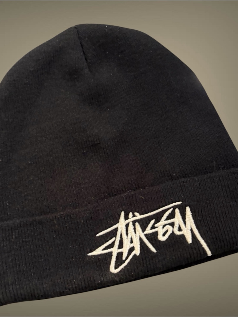 Stüssy Stock Cuff Beanie in black with an embroidered white logo.